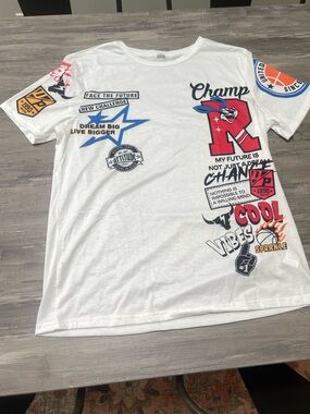 White Athletic Graphic Tee with Colorful Patches